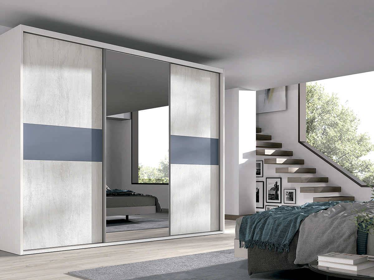  mueble ropero que destaca por su diseño práctico y espacioso. con 3puertas correderas 300cm embutidas que se apoyan sobre una guía en el suelo y espejo. Modelo EOS-68