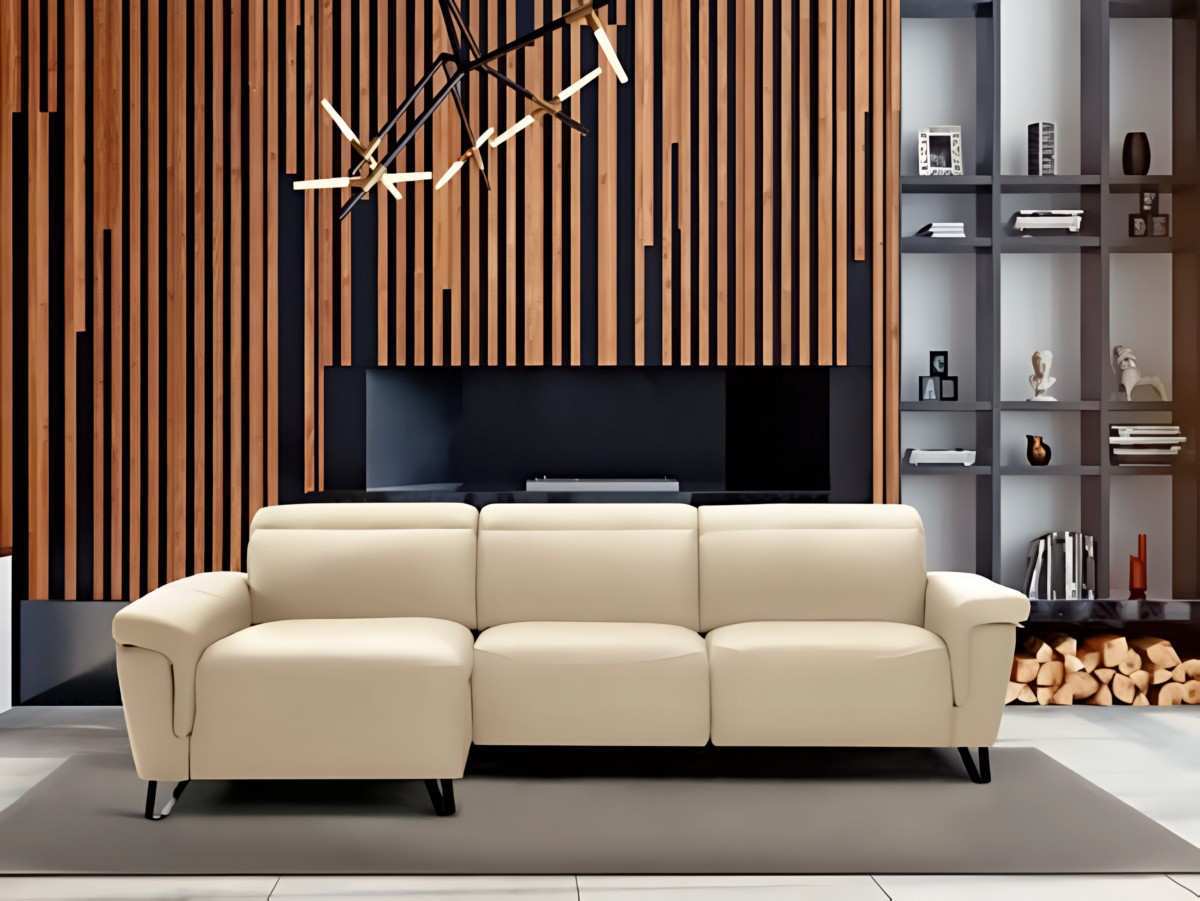  el sofá enara de la nueva colección de divanistar cuenta con una estructura de madera de pino y partículas, mientras que los brazos y respaldos están fabricados con madera de partículas. el recubrimiento está compuesto por espuma de poliuretano de 1. 5cm. los almohadones de los asientos son de hr 30 kg con fibra de 400 gr, y los almohadones del respaldo están hechos de fibra de alta resistencia optifibre . el sofá ofrece la opción de cojines de asiento relax motorizados, o versión fija. las patas son metálicas y, si se opta por el tapizado en piel, no se incluirán decorativos de serie en ninguna de sus modulaciones. se ofrece la opción de cabezal eléctrico por un incremento de 40 puntos, y el módulo tumbona solo está disponible con cabezal manual. divanistar se especializa en la fabricación de sofás con asientos deslizantes.. Modelo ENARA, imagen 4